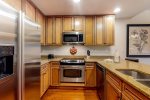 Stainless steel appliances in this updated kitchen 